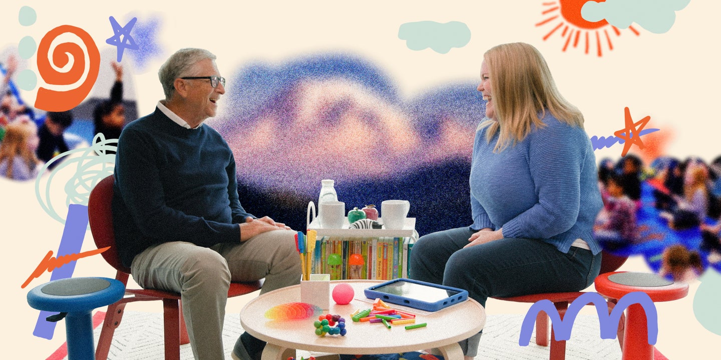 Bill Gates and Kim Broomer, the 2025 Washington State Teacher of the Year, sit and laugh together at a table with a tablet and other learning tools from a kindergarten classroom. 
