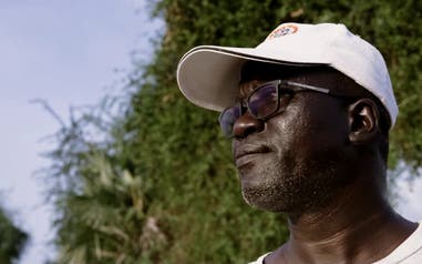 Makoy Samuel Yibi looking off in the distance.