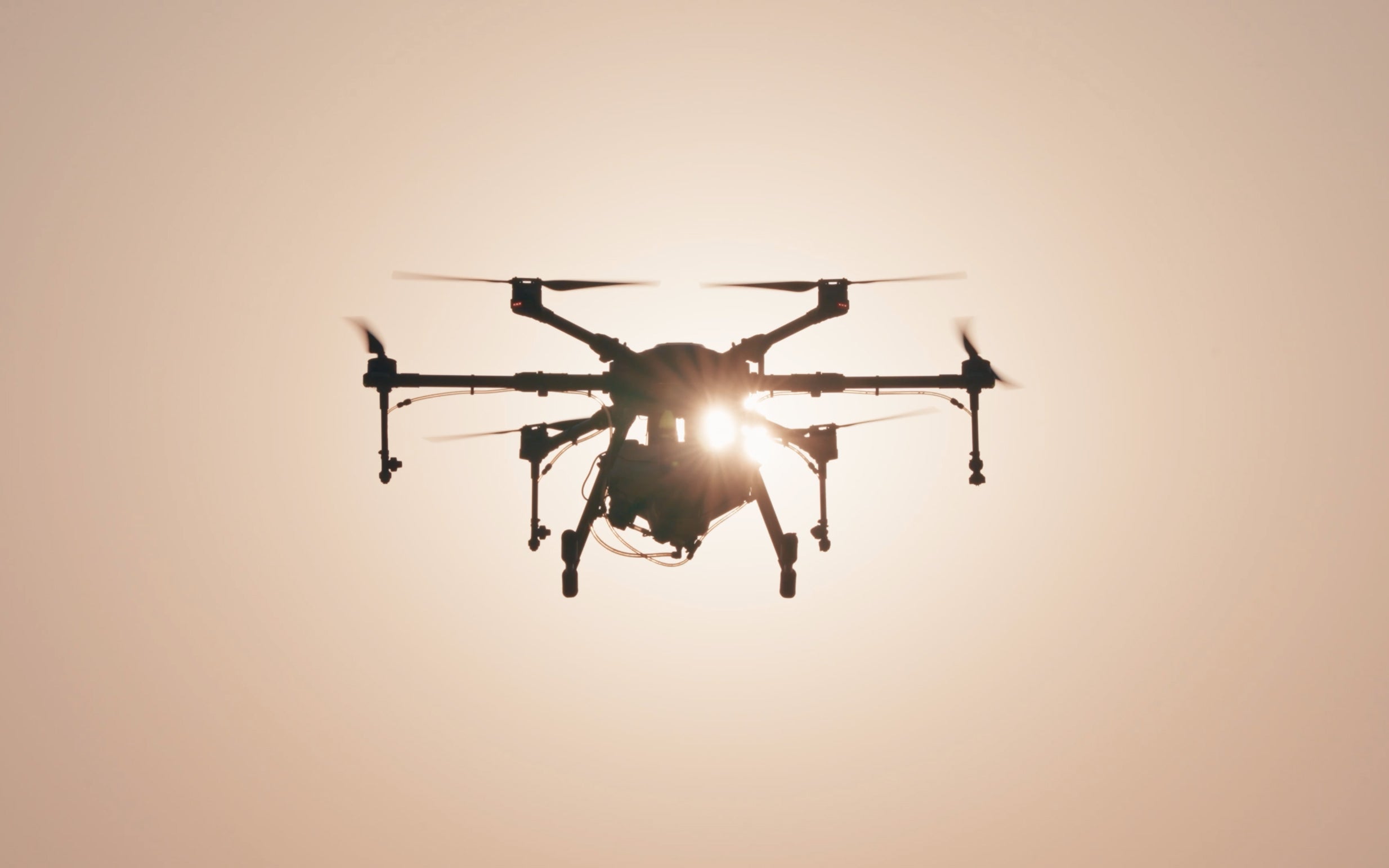 A drone flying in the air.